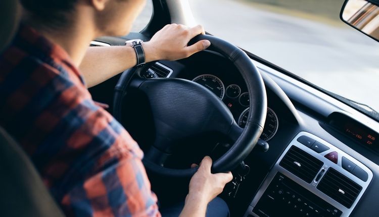 Man driving a car